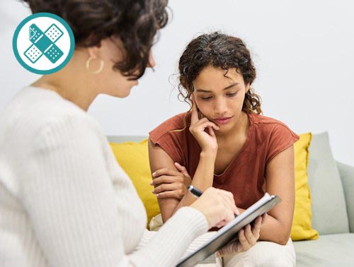 Sad woman with psychologist